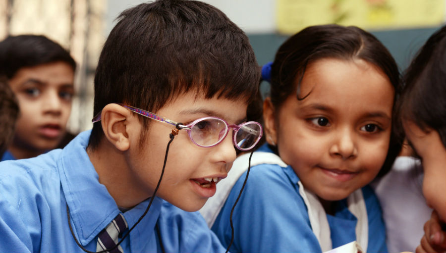 Student beneficiary wearing spectacles supported by SiB Pakistan Urban Peadiatric Eye Care project/ Story: 2019 in Review: Seeing is Believing