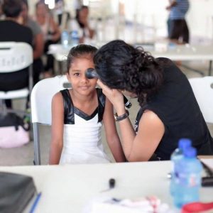 Retinal screening on a 6 y.o. girl; Photo by Pooja Doshi