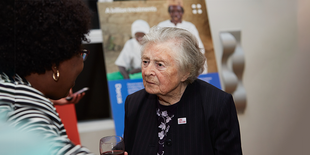 Lady Jean Wilson talks to Sightsavers staff at an event to celebrate the distribution of 1 billion treatments for neglected tropical diseases in 2017.