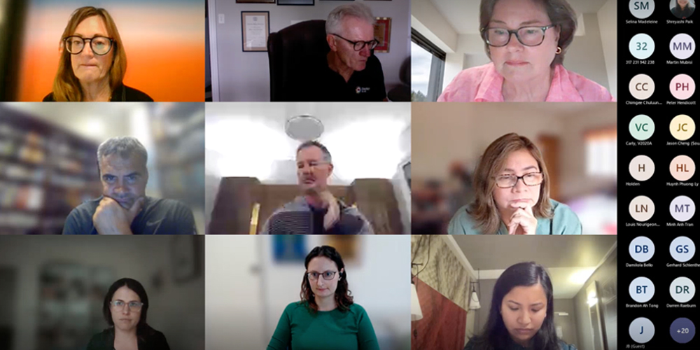 Screenshot of several people on Zoom