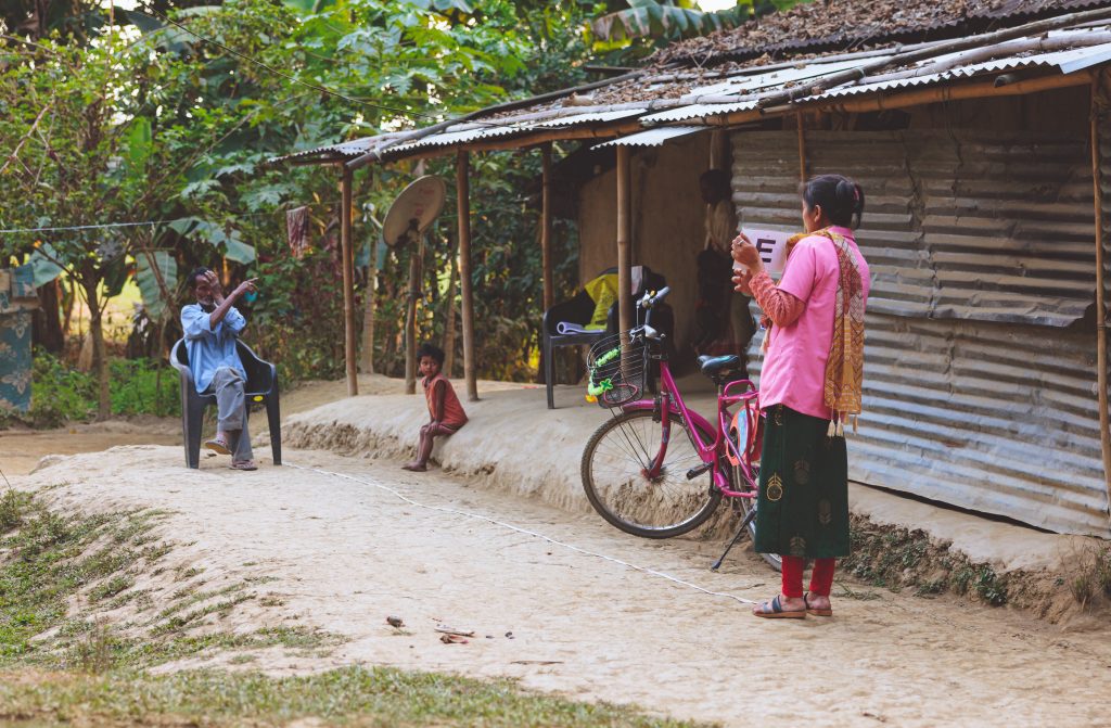  Doibaki, one of Operation Eyesight’s community health workers, conducts an eye health survey in a village in Assam, India. Along with conducting vision screenings, community health workers also educate community members about immunization and other public health issues, as well as connect patients with their local health system.