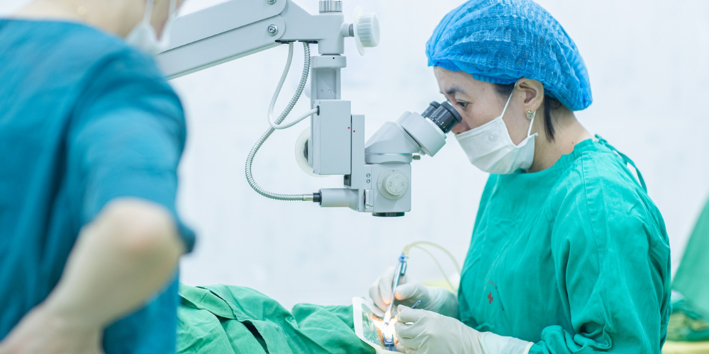 Female surgeon doing cataract surgery