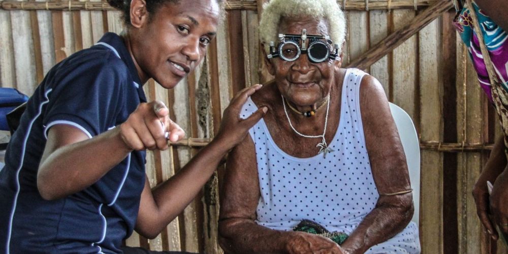 Vision Testing to an old woman during a Village Screening