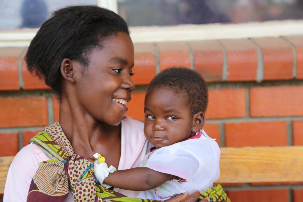 Mother holding her child