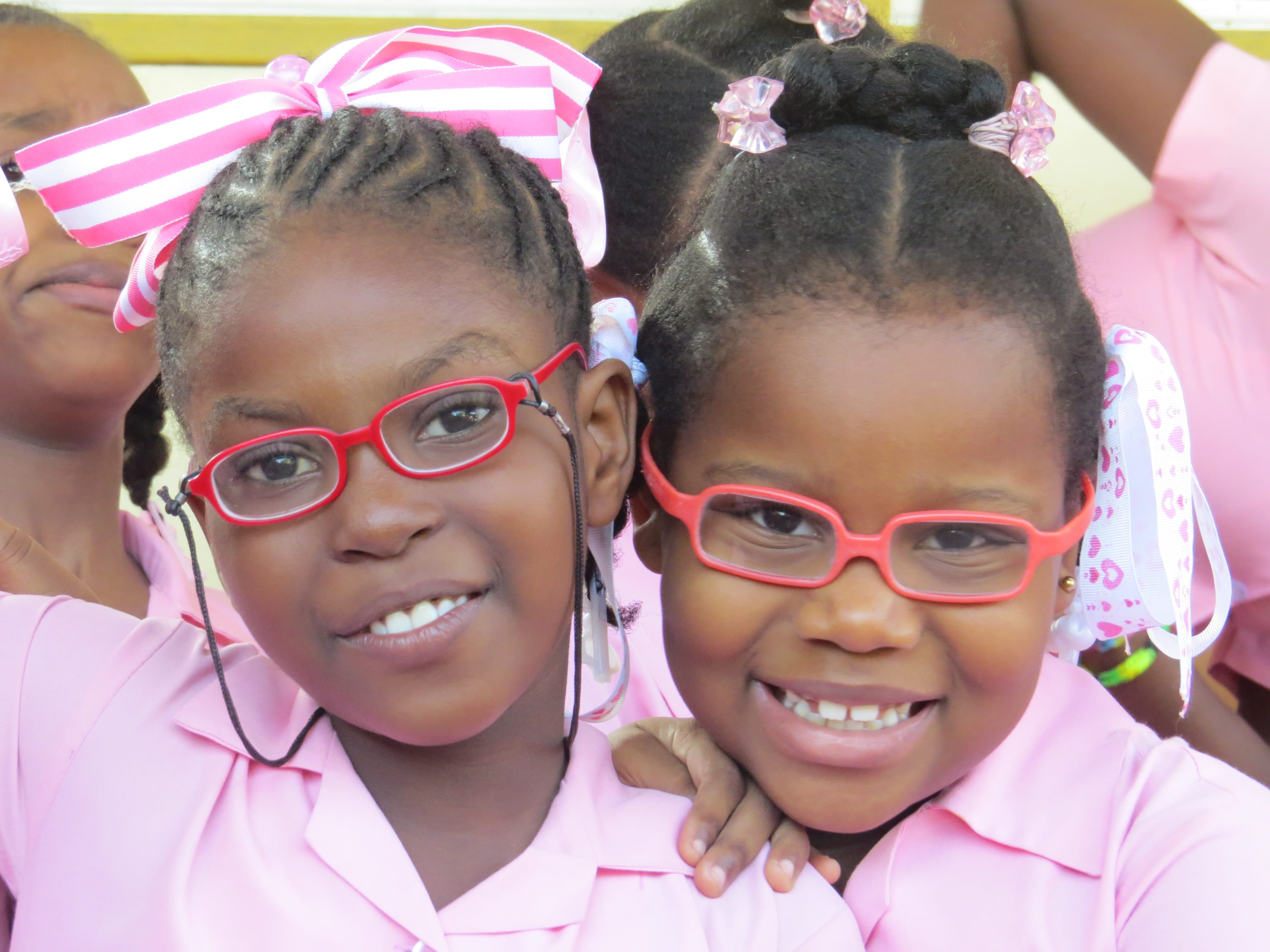 Britany and her Classmate in a eye screening at her school by Pierre Yves Decastro 