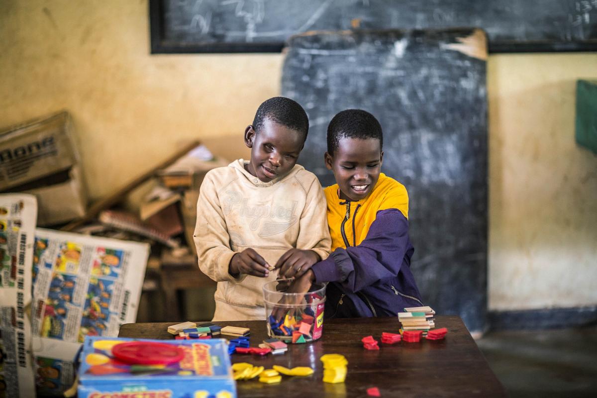 : Susan enjoys the activities at the school’s resource centre, which is set up to help children to develop their cognitive abilities using different materials and touch