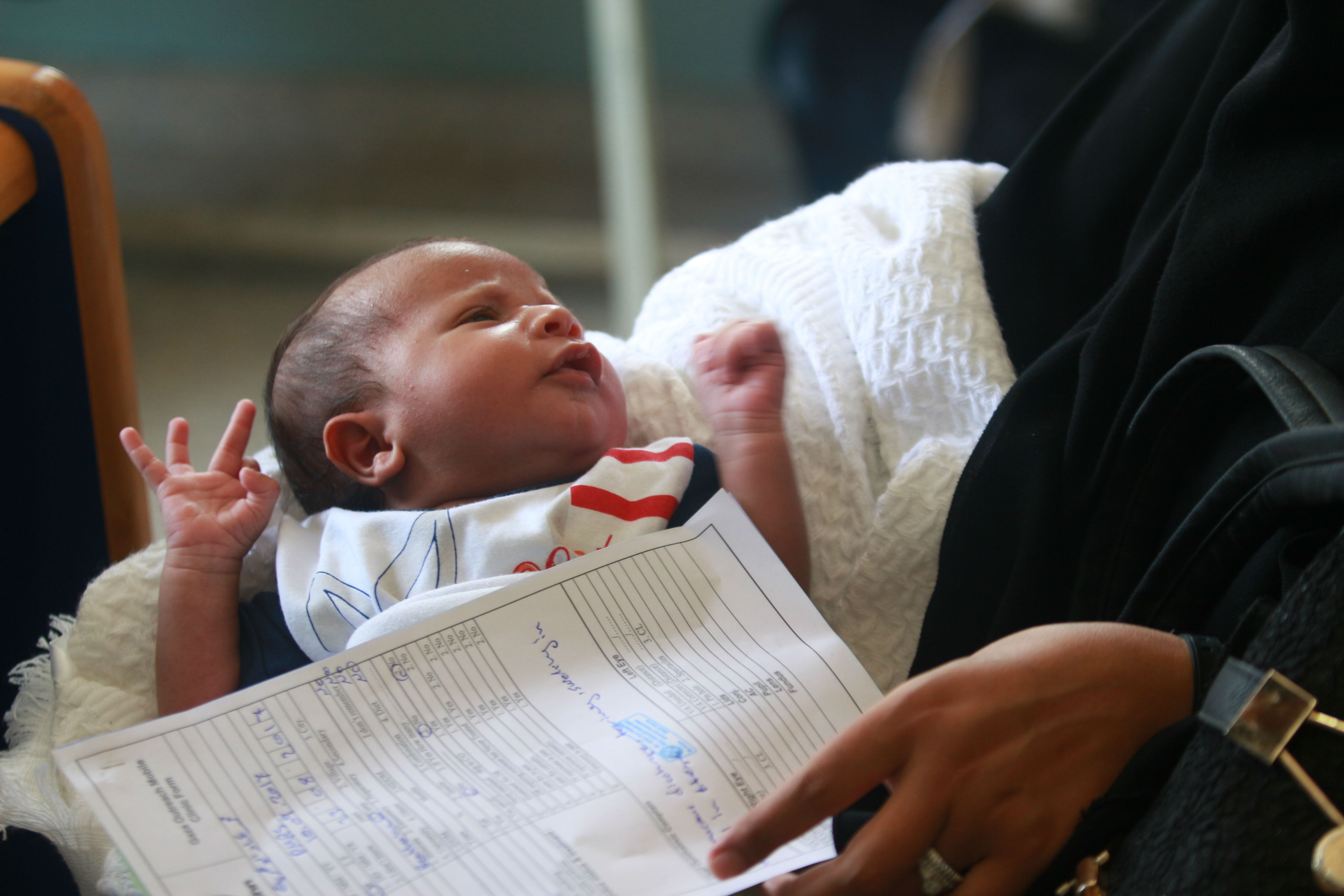 Introducing the St John of Jerusalem Eye Hospital Group /A baby awaits his appointment Outreach in Gaza September 2017 Credit Fadi Thabet