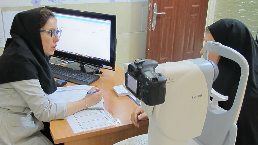 A family health worker is capturing the fundus images to be later screened by a trained general practitioner for ‘referable retinopathy’