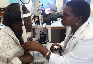 Agnes examines a patient’s eyes at Iten Eye Unit