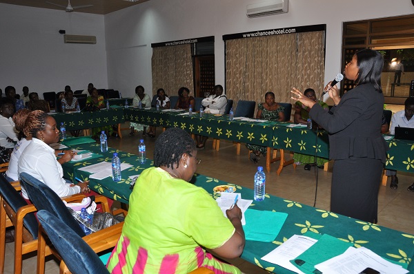 Akweley of Standard Chartered Bank, Ghana Ltd, delivering a session in customer care to ophthalmic nurses