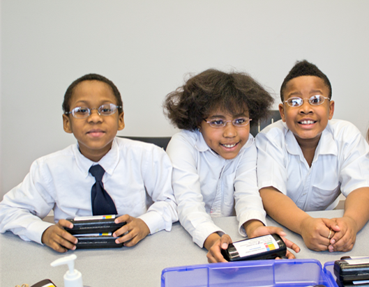 BREDS students receive their new glasses