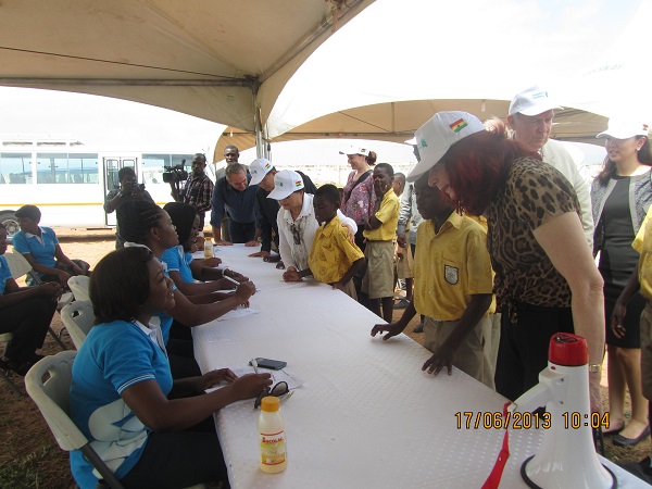 Board Members assisting pupils through the screening programme