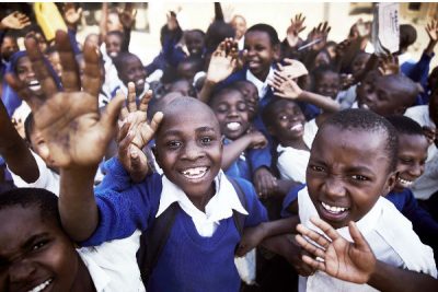 Children in Tanzania play to the camera