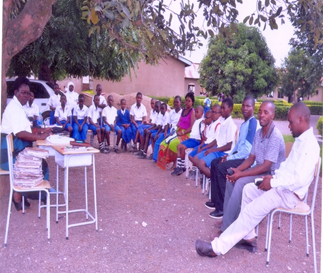 District eye coordinator and school eye health club team sharing some of the events of eye health .In a sense of integrating eye health to the schools