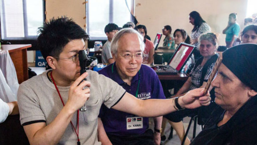 Dr Akio Kanai (2nd from right) in Azerbaijan in 2018