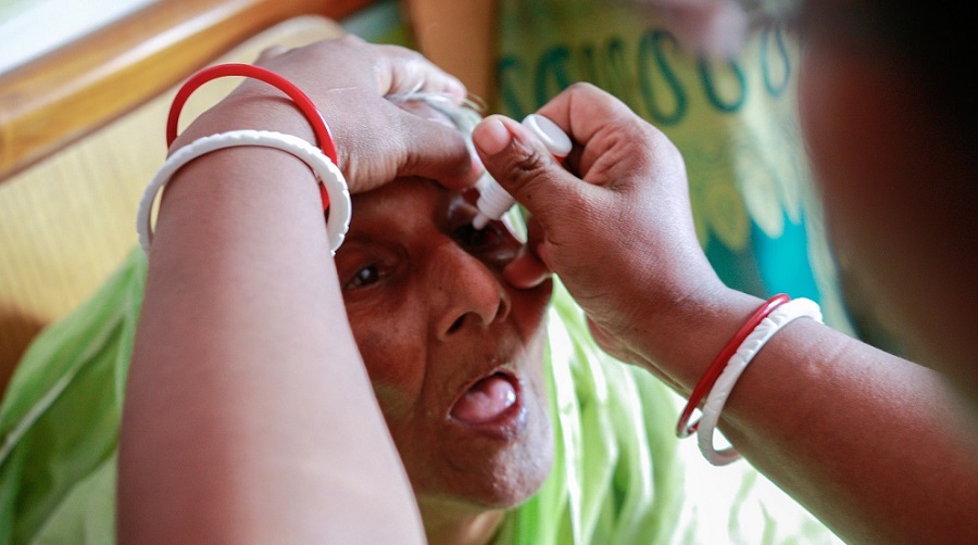 Lady receiving eye ointment