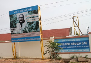 Billboard of cataract at the gate of Dak Nong SDPC