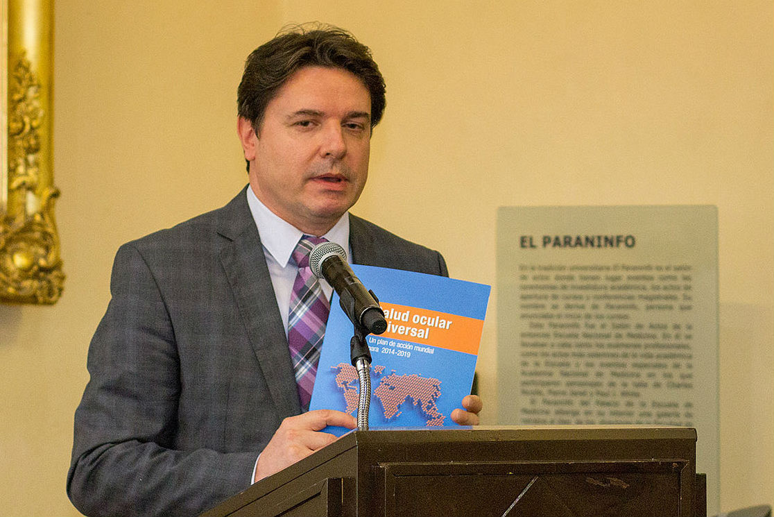 Dr Ivo Kocur, WHO holding a Spanish version of the Global Action Plan document; WSD Mexico event 2014