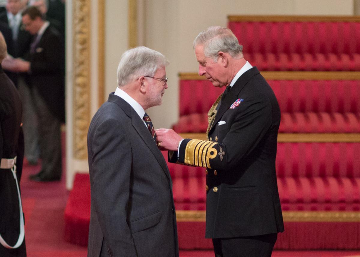 Dr Adrian Hopkins invested with MBE