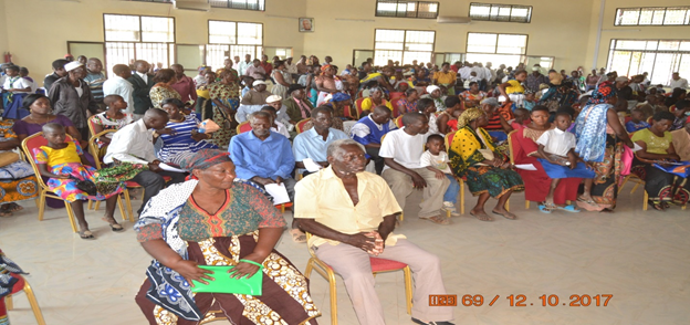 People waiting to be screened