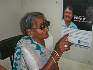 Old woman getting her eyes checked; Sightsavers, SiB