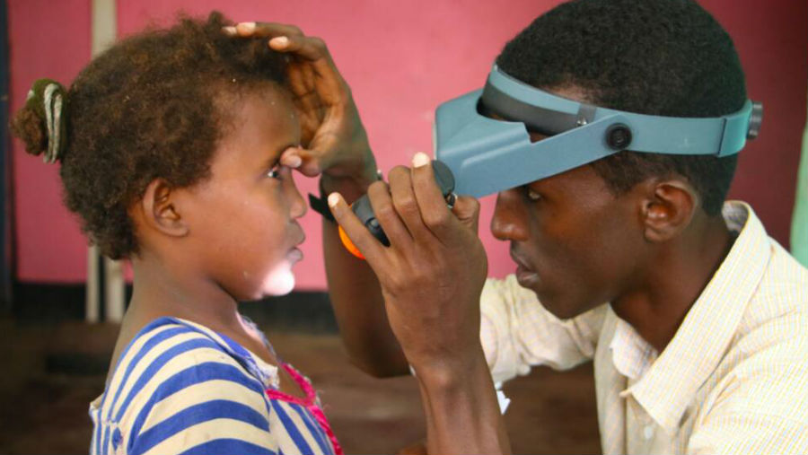 Achieving universal health coverage - how the global trachoma elimination programme is taking us a step closer/ Image: Girl being examined for trachoma