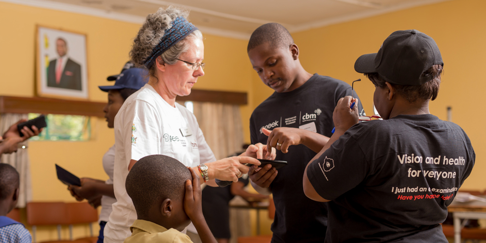 Karen in action on a training visit to one of the programmes using Peek in Zimbabwe a few years ago.